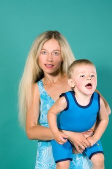 Mother Holds Her Son In Arms Royalty Free Stock Photo