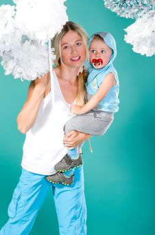 Mom Holds Her Son In Her Arms Royalty Free Stock Photo