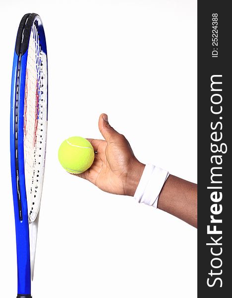 Image of a tennis racket with a hand slapping the ball