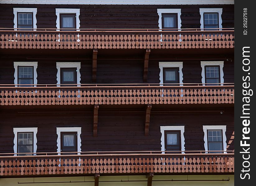 Windows and balcony of old hotel building. Windows and balcony of old hotel building