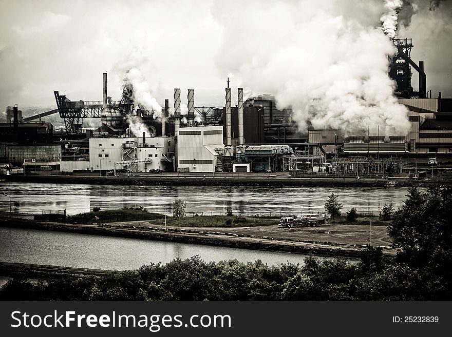 A picture of the pollution that comes from the local steel plant. Note: you are not allowed to smoke cigarettes anywhere on the property. Hypocrites!. A picture of the pollution that comes from the local steel plant. Note: you are not allowed to smoke cigarettes anywhere on the property. Hypocrites!