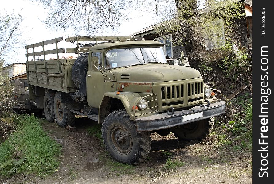 Cargo car ZIL-131 with a wooden body outdoors. Cargo car ZIL-131 with a wooden body outdoors