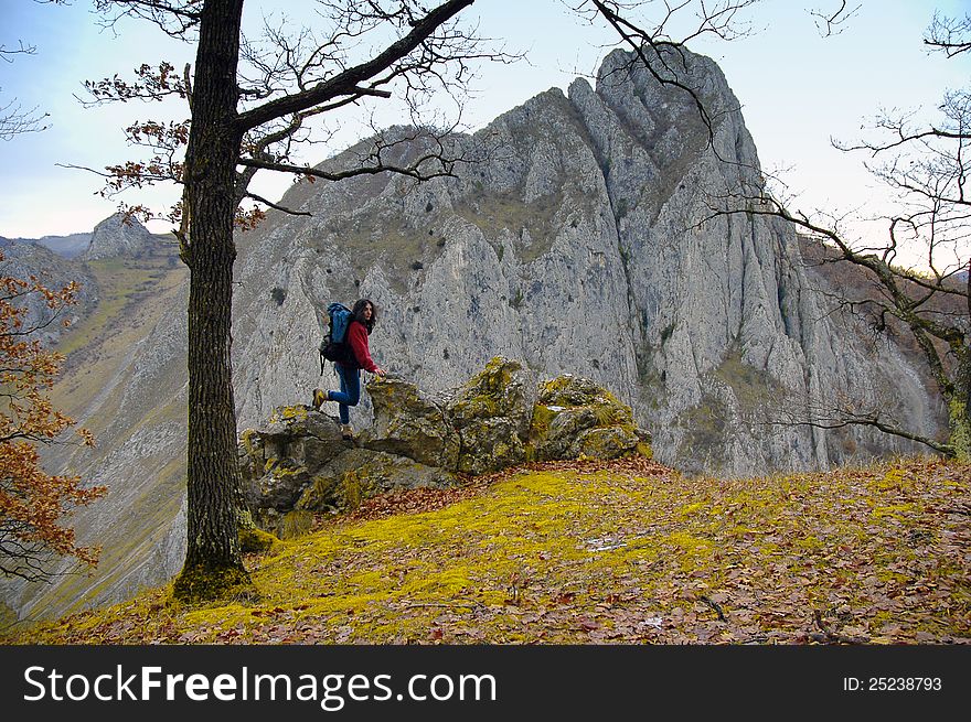 Beautiful limestone gorge and a woman admiring it