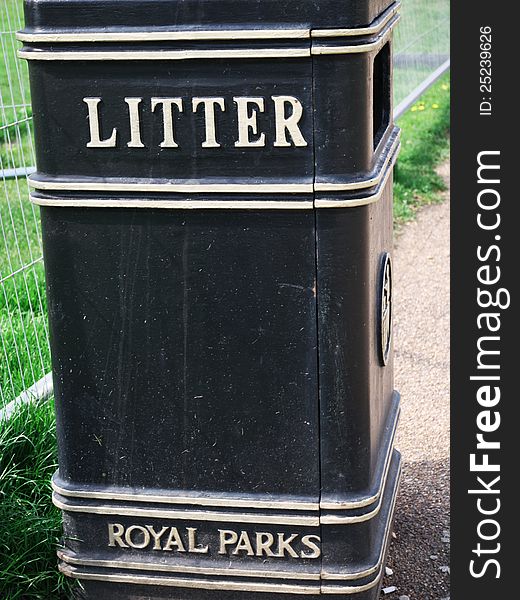 Traditional trash can or litter box in one the royal parks in London. Traditional trash can or litter box in one the royal parks in London