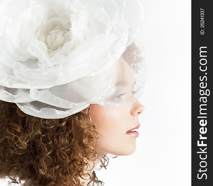 Happy beautiful curly red hair bride on white background close up. Happy beautiful curly red hair bride on white background close up