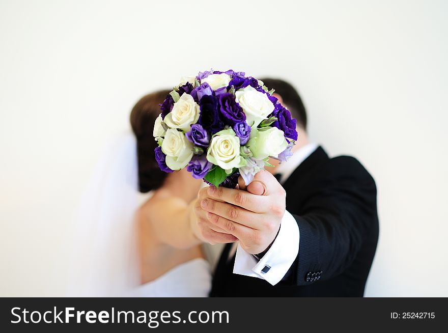 Wedding bouquet with fig. Blur white background