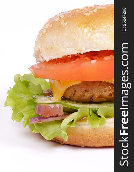 Tasty Hamburger with beef, tomato, letucce and cheese closeup clipping path. Tasty Hamburger with beef, tomato, letucce and cheese closeup clipping path