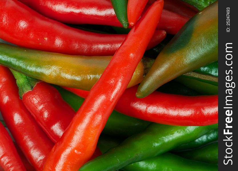Fresh Red and Green Chili peppers background