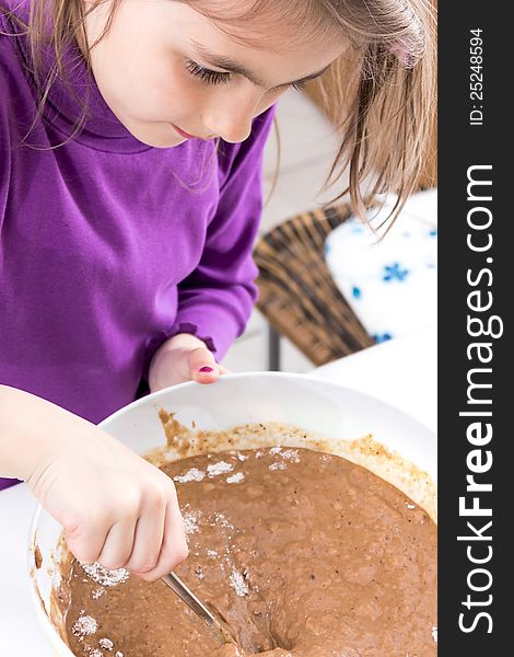 Little Girl Baking In The Kitchen