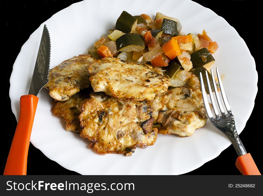 Chicken cutlets with vegetables