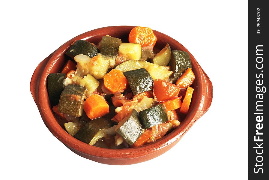 Stuffed vegetables in ceramic bowl over white background