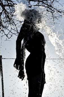 Sexy Woman Enjoys The Water Splash In The Outdoors Stock Photos