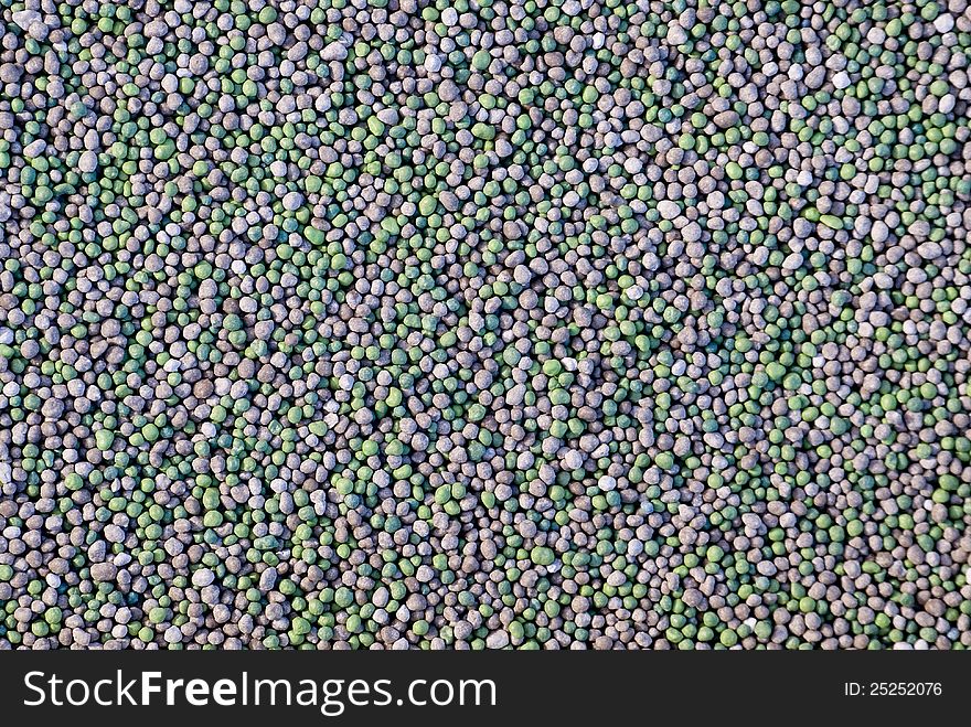 Texture of green and brown pebbles. Texture of green and brown pebbles.