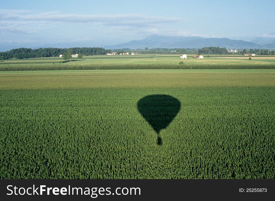 Green fields and shadow of a balloon in Italy. Green fields and shadow of a balloon in Italy.