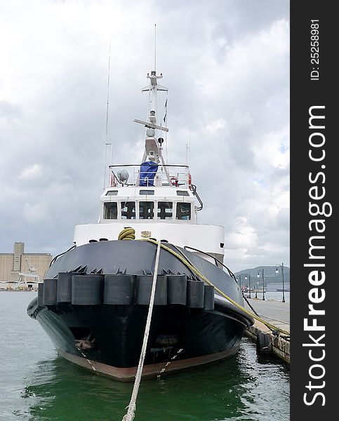 Detail of moored tugboat in the port