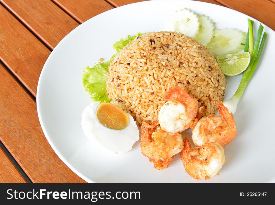 Thai food style call Fried rice with chili paste served with fried shrimp and salted egg.