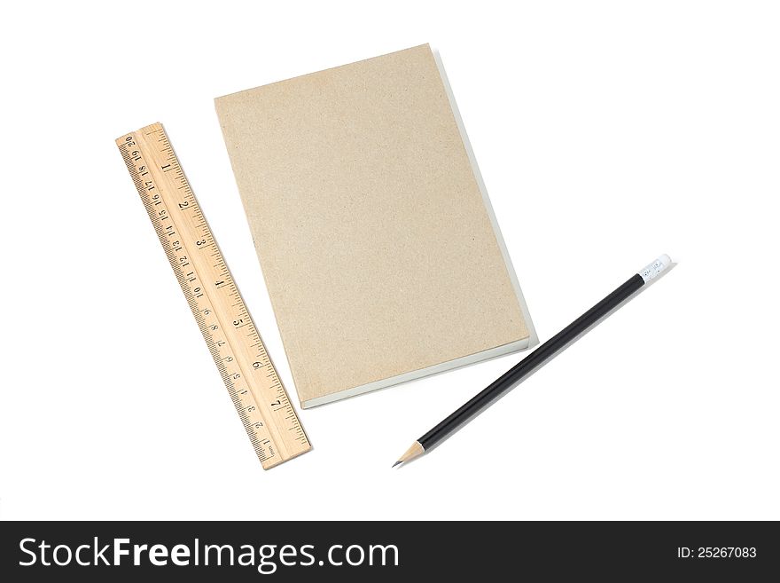 Book, Ruler and pencil on white background