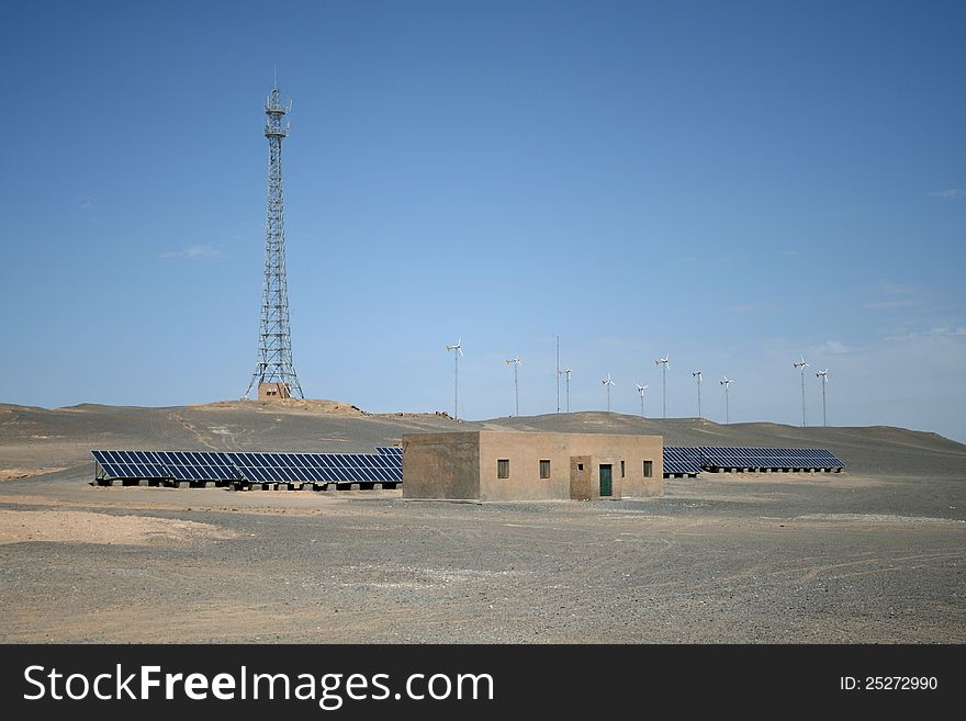 Wind turbines and solar panels in Gobi desert, Dunhuang China