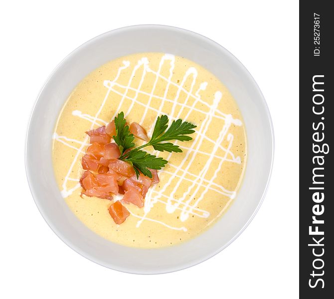 Bowl of creamy soup with salmon