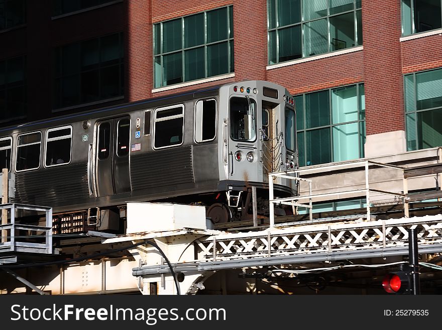 Close view of the EL Overhead commuter train in Chicago. Close view of the EL Overhead commuter train in Chicago