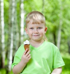 Child Eating A Tasty Ice Cream Outdoors Royalty Free Stock Image Child Eating A Tasty Ice Cream Outdoors Royalty Free Stock Image