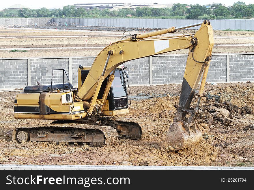 Backhoe is working on construction site