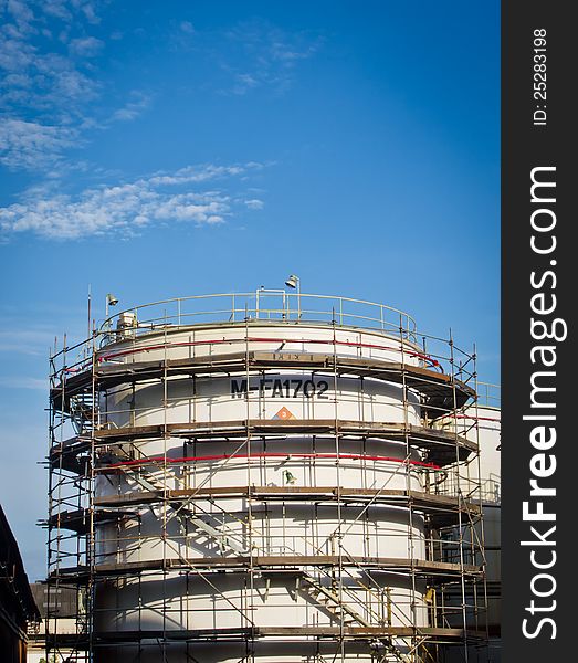 Fuel tank among maintenance in blue sky day