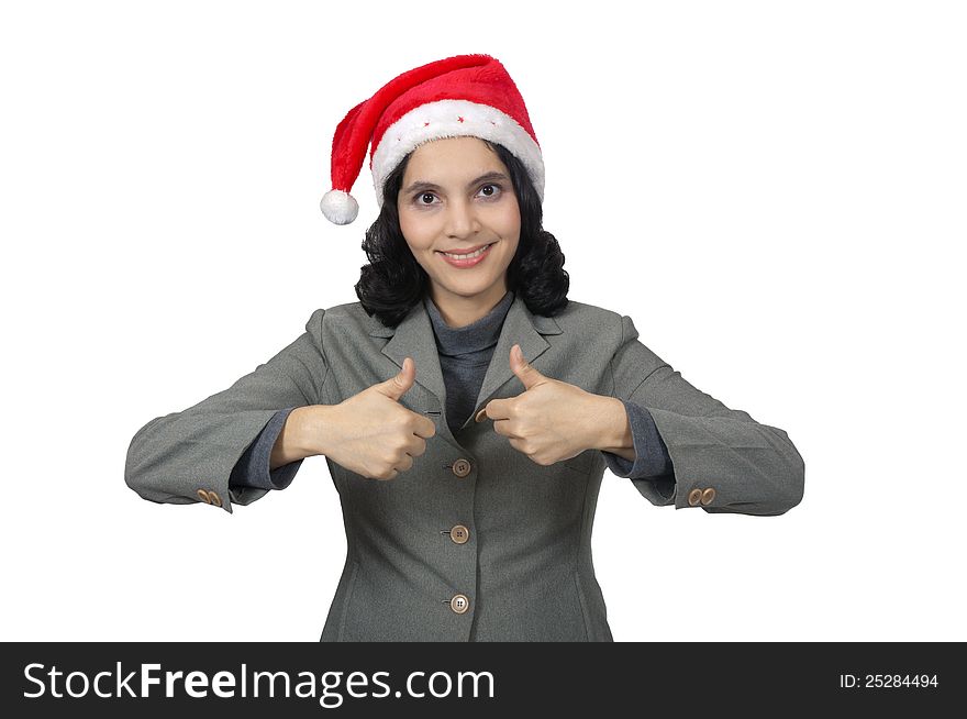 Mixed race business woman wearing santa hat, show her thumb isolated over white background. Mixed race business woman wearing santa hat, show her thumb isolated over white background