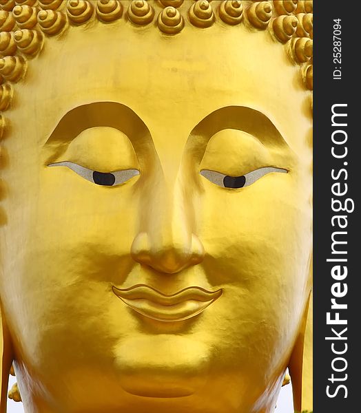 Close up shot of the smile Buddha's face. Close up shot of the smile Buddha's face