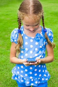 Girl Holding A Cell Phone Stock Photo Girl Holding A Cell Phone Stock Photo