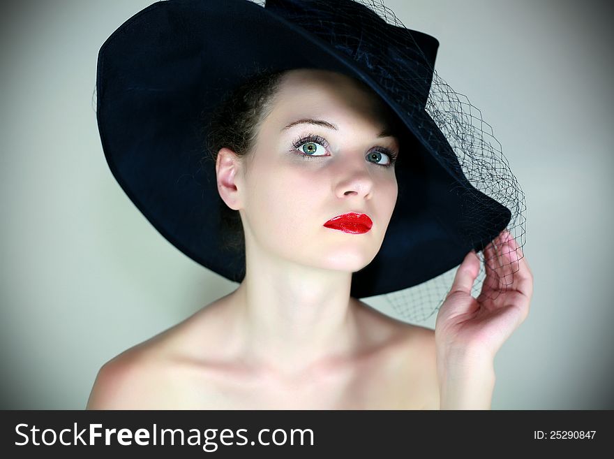 Fashion girl in retro hat. Fashion girl in retro hat