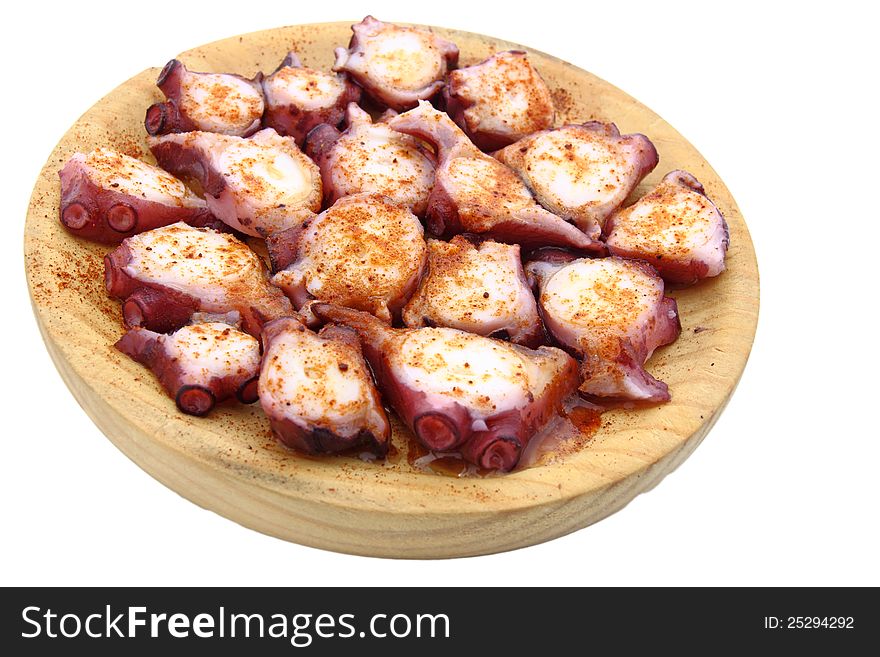 Typical Galician octopus with on the wood. Typical Galician octopus with on the wood