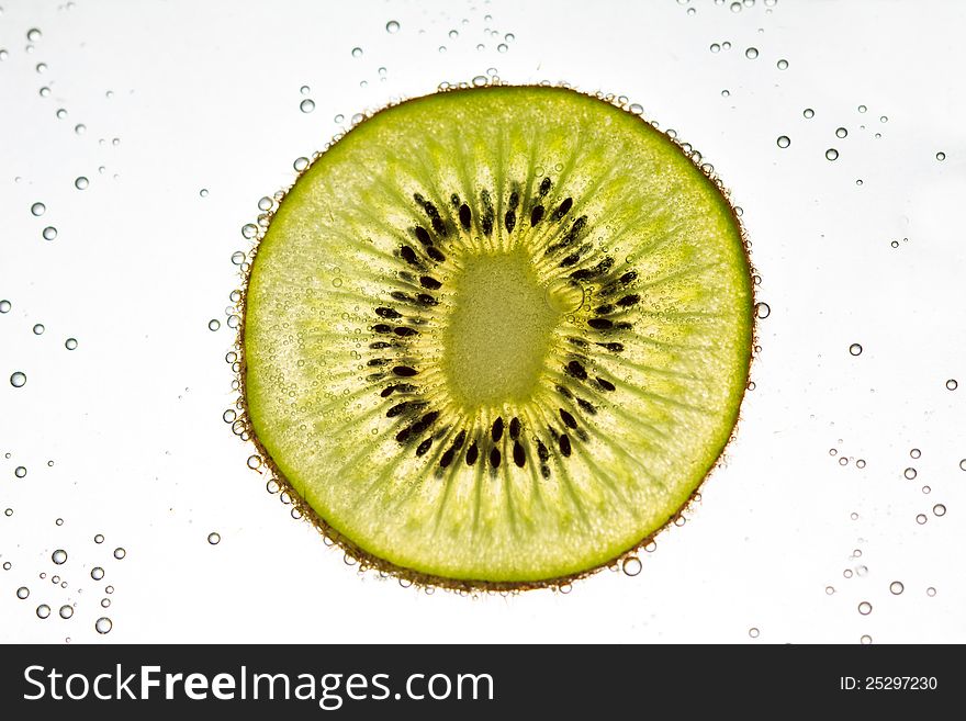 Kiwi Fruit Floating In Soda Water