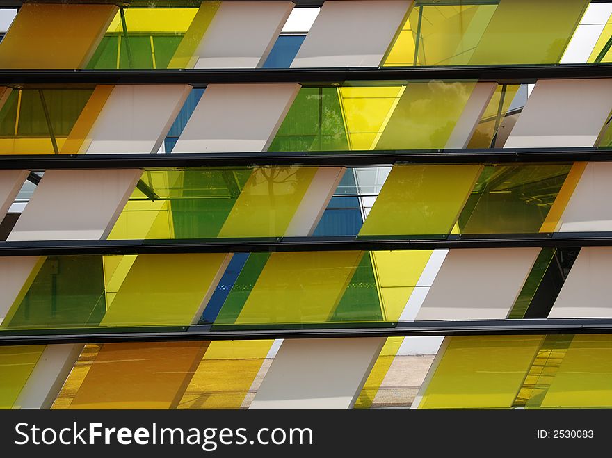 Colorful tinted glass walk way in the parks