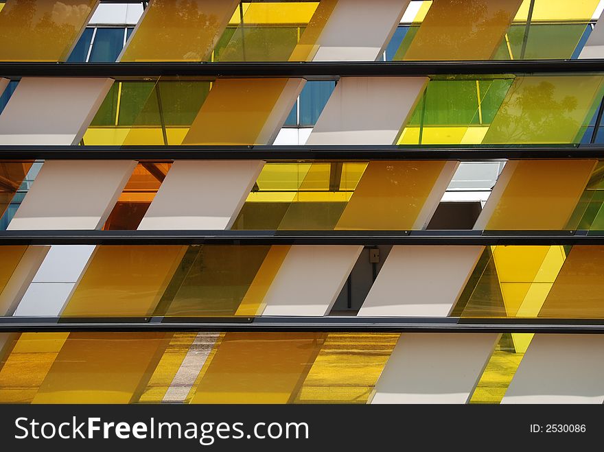 Colorful tinted glass walk way in the parks