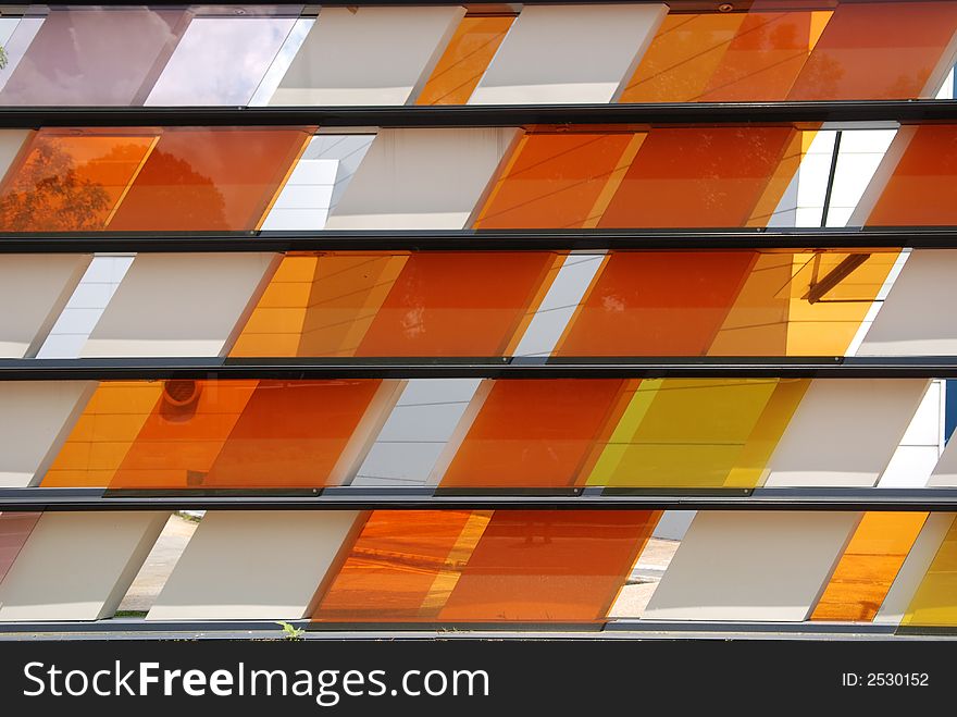 Colorful tinted glass walk way in the parks