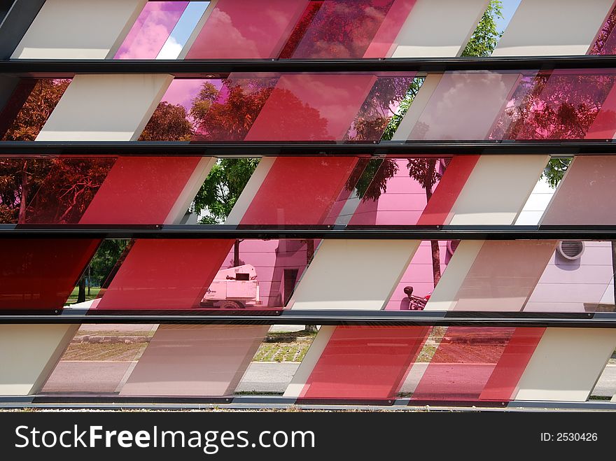 Colorful tinted glass walk way in the parks