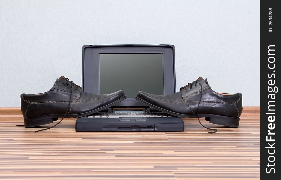 Shoes On Laptop