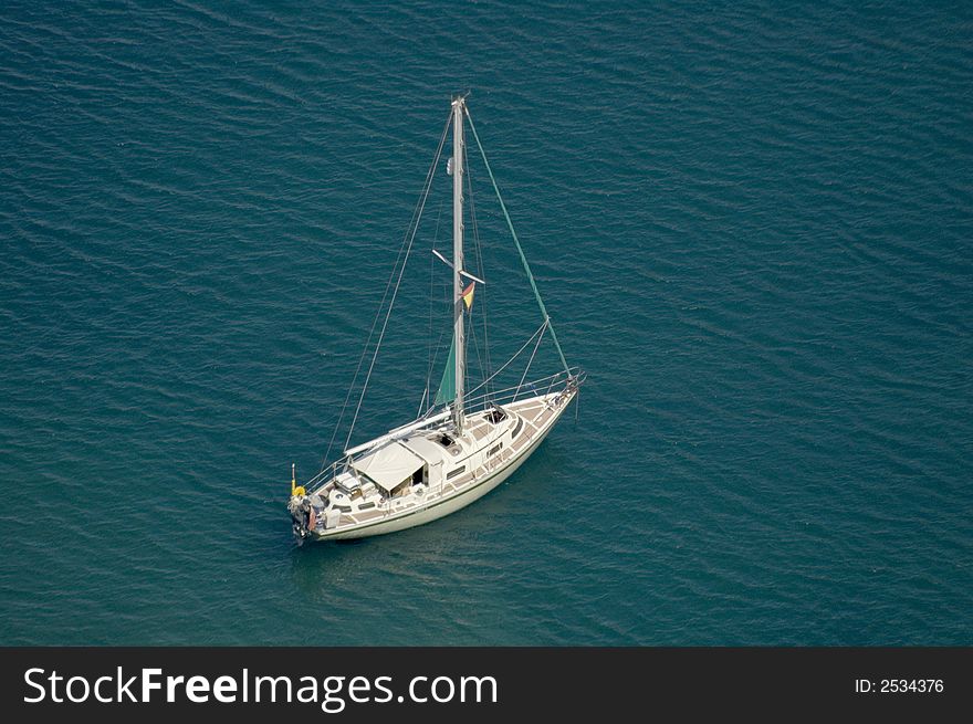 A single large yacht sitting in the sea