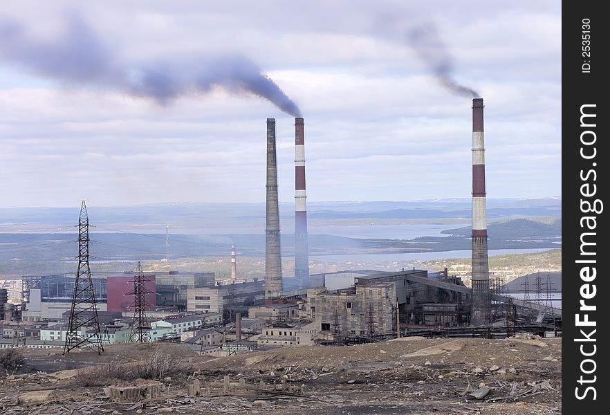 Factory in the north of Russia polluting environment. 
Ecocatastrophe.