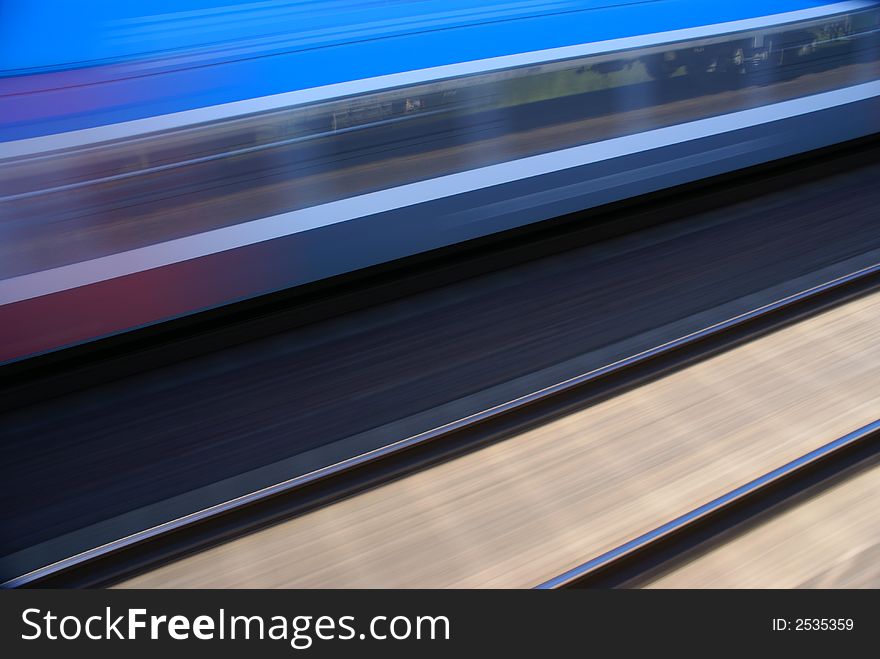 Motion blurred train and tracks. Motion blurred train and tracks