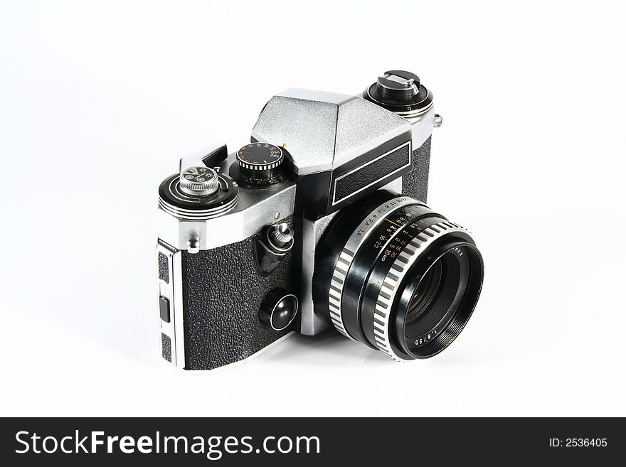 Old reflex photo camera Praktica super TL on white background