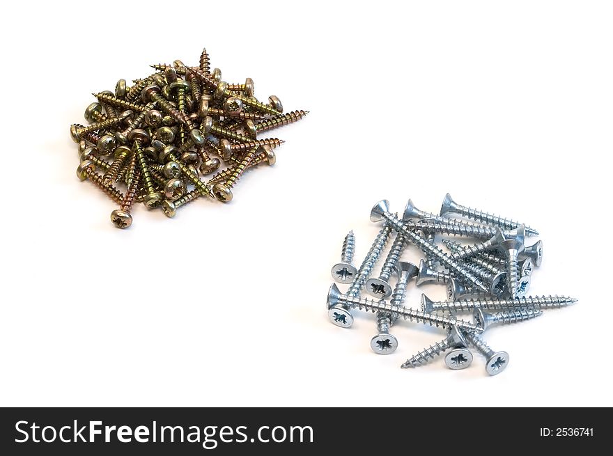 Resistance of steel and chrome screws on the white background. Resistance of steel and chrome screws on the white background