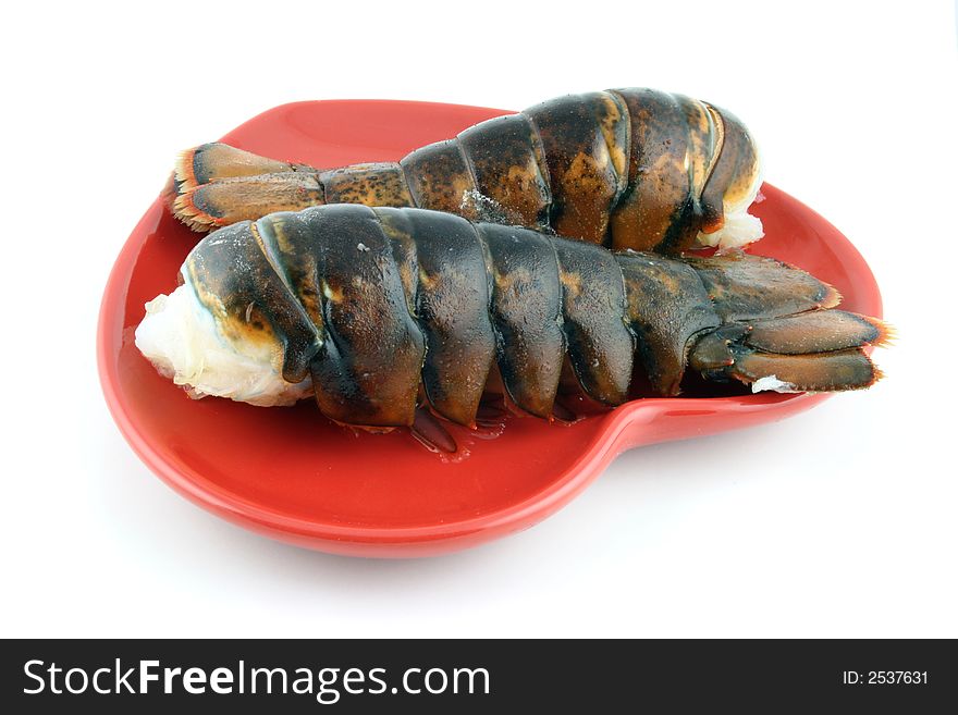 Lobsters on a red plate