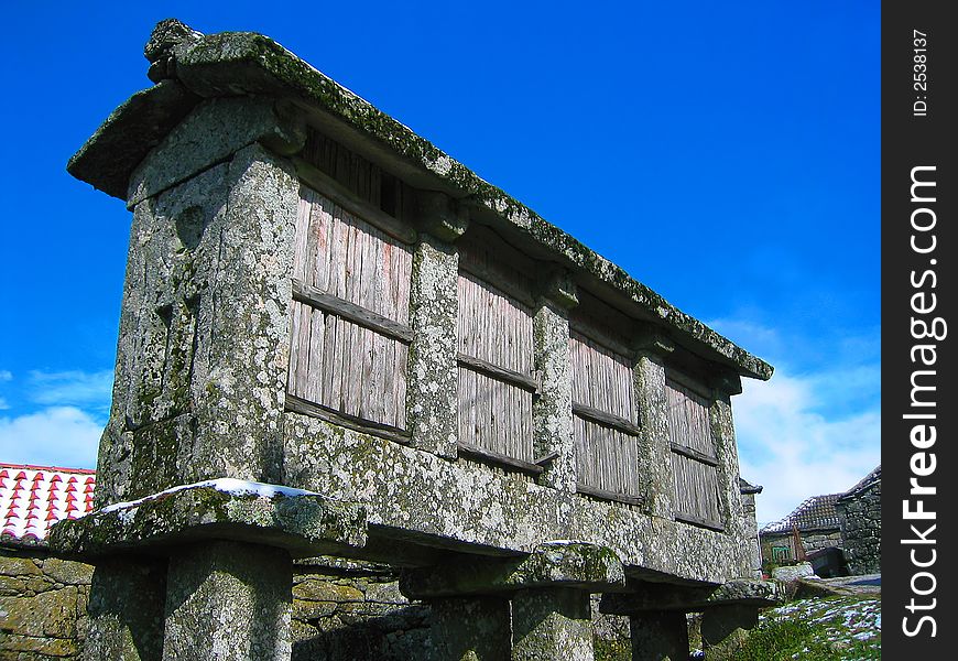 The Espigueiros are mostly stone (sometimes wood) constructions in Northern Portugal where the corn is dried in the Winter. The Espigueiros are mostly stone (sometimes wood) constructions in Northern Portugal where the corn is dried in the Winter.