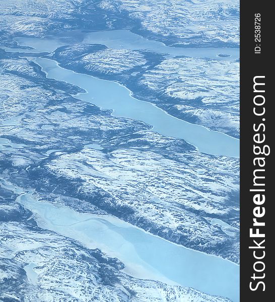 Arial view of the icecovered land of Canada. Arial view of the icecovered land of Canada