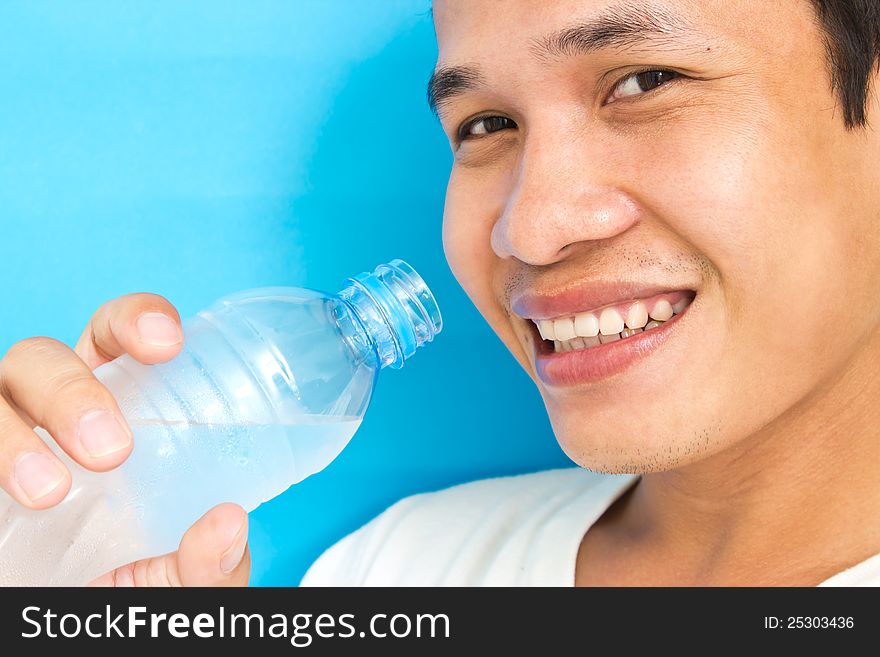 Asian Man drinking Water close up