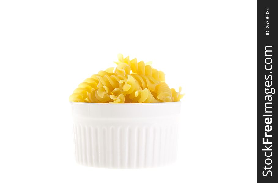 Bowl of raw yellow macaroni