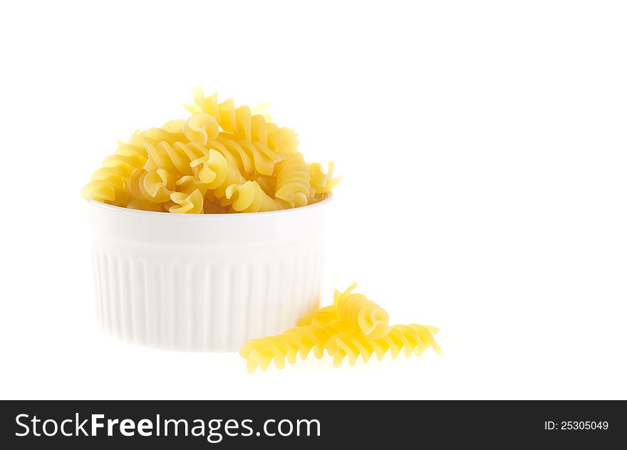 Bowl of raw yellow macaroni