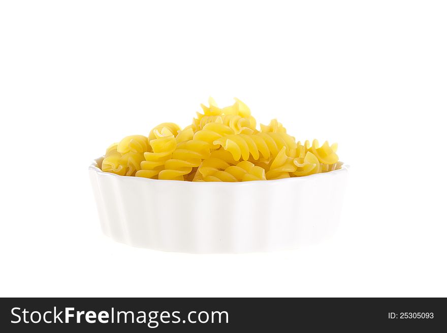 Bowl of raw yellow macaroni